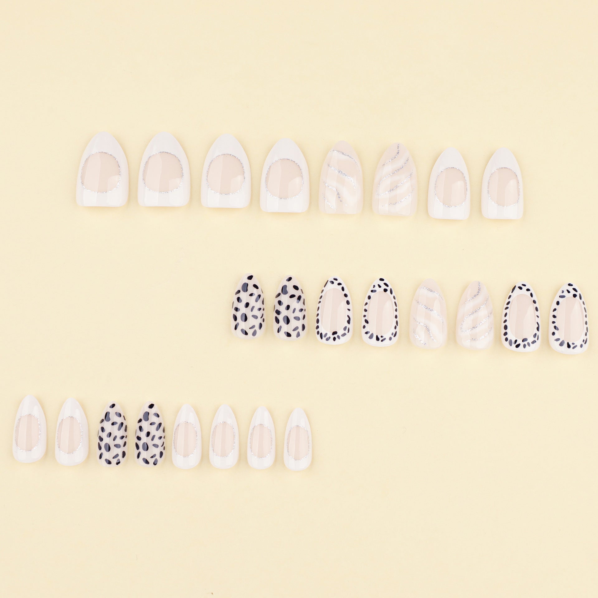 Chic Monochrome Nails with Dalmatian Spots and White Accents