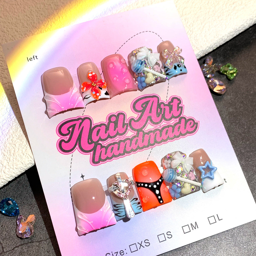 Mixed Color Nails with Sculpted Charms and Playful Details