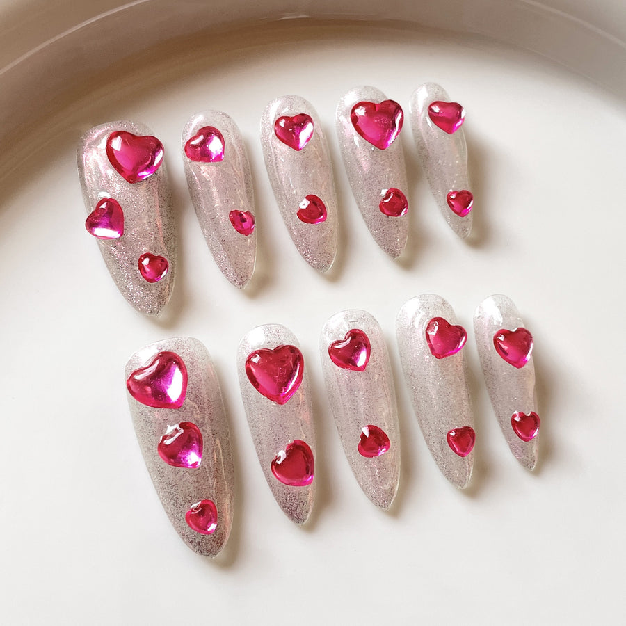 Iridescent Barbie Pink Heart Nails with Shimmer Glow