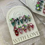 Red and Green Christmas Press‑On Nails – Gem & Snowflake Luxury Design