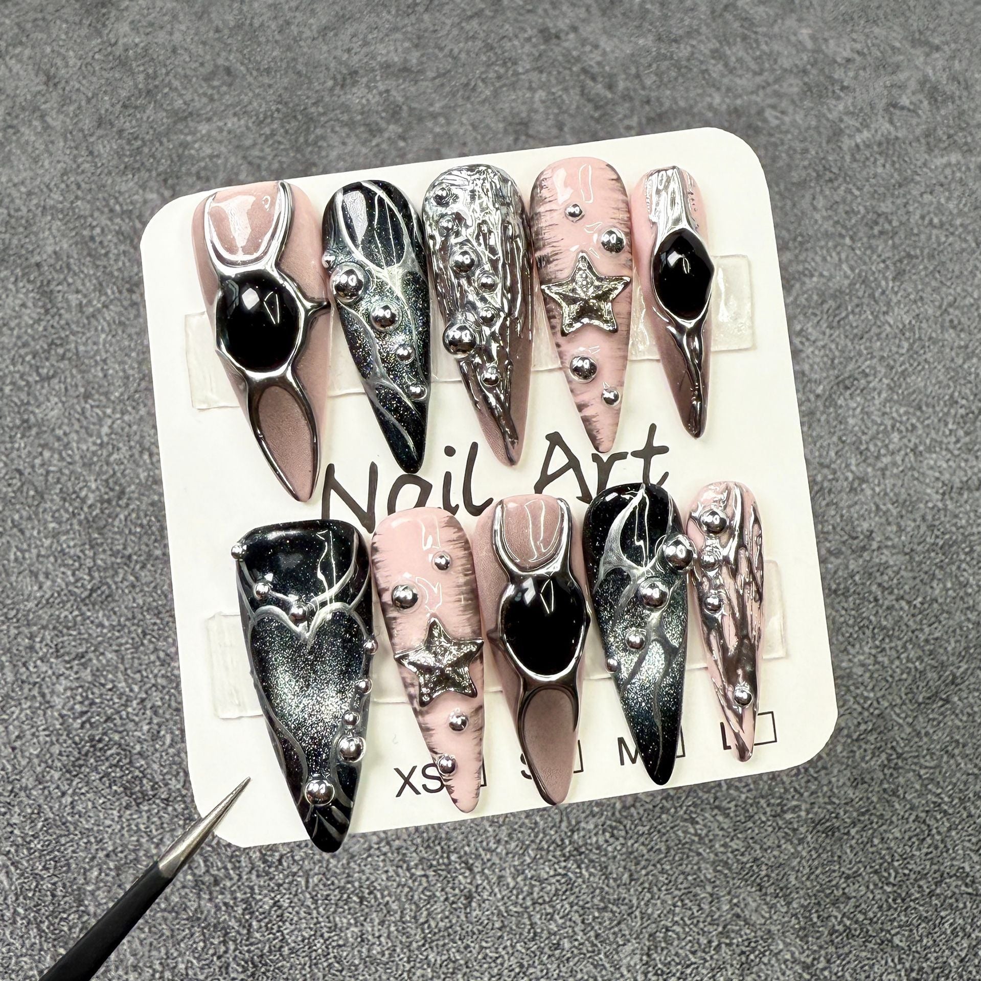 Futuristic Press-On Nails with Chrome Details and Star Accents