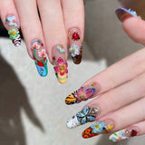 Uñas francesas con flores e insectos tridimensionales de Elfo de la Isla de Verano | 365nails