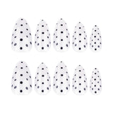 Black dots almond on white background press-on nails