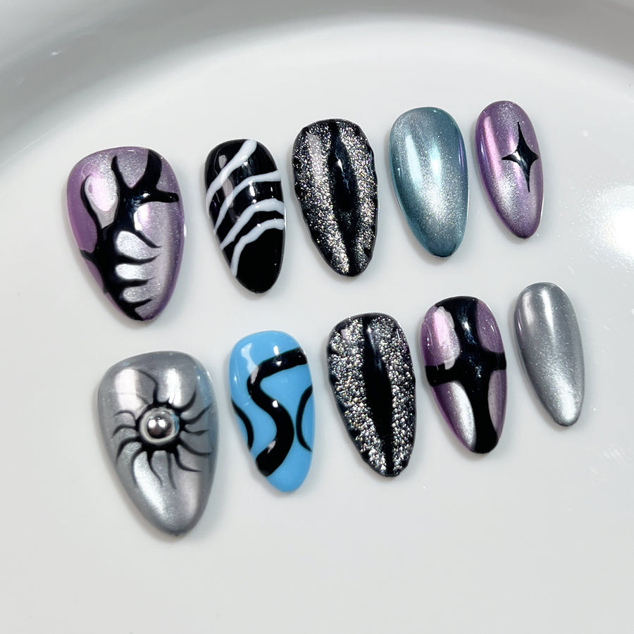 Hand-Painted Cat-Eye Nails with Silver Metallic Accents