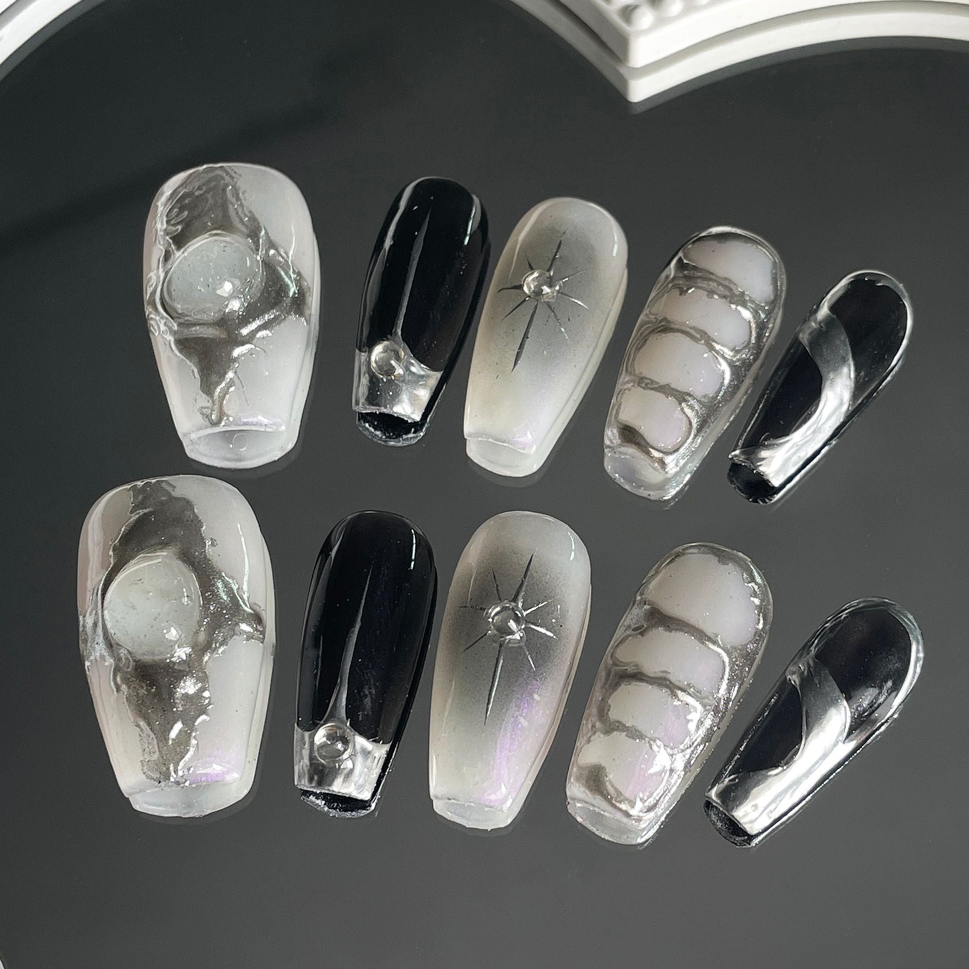Black and Silver Nails with Sculpted Chrome Details