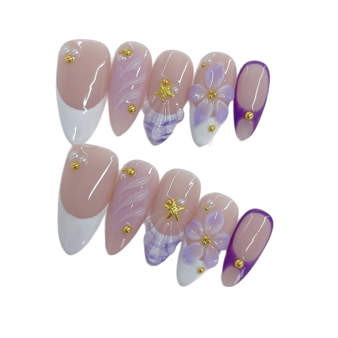 Élégant pastel : « French floraison lavande » — ongles press-on fait main, mi-longs, forme amande, nude & dégradé violet