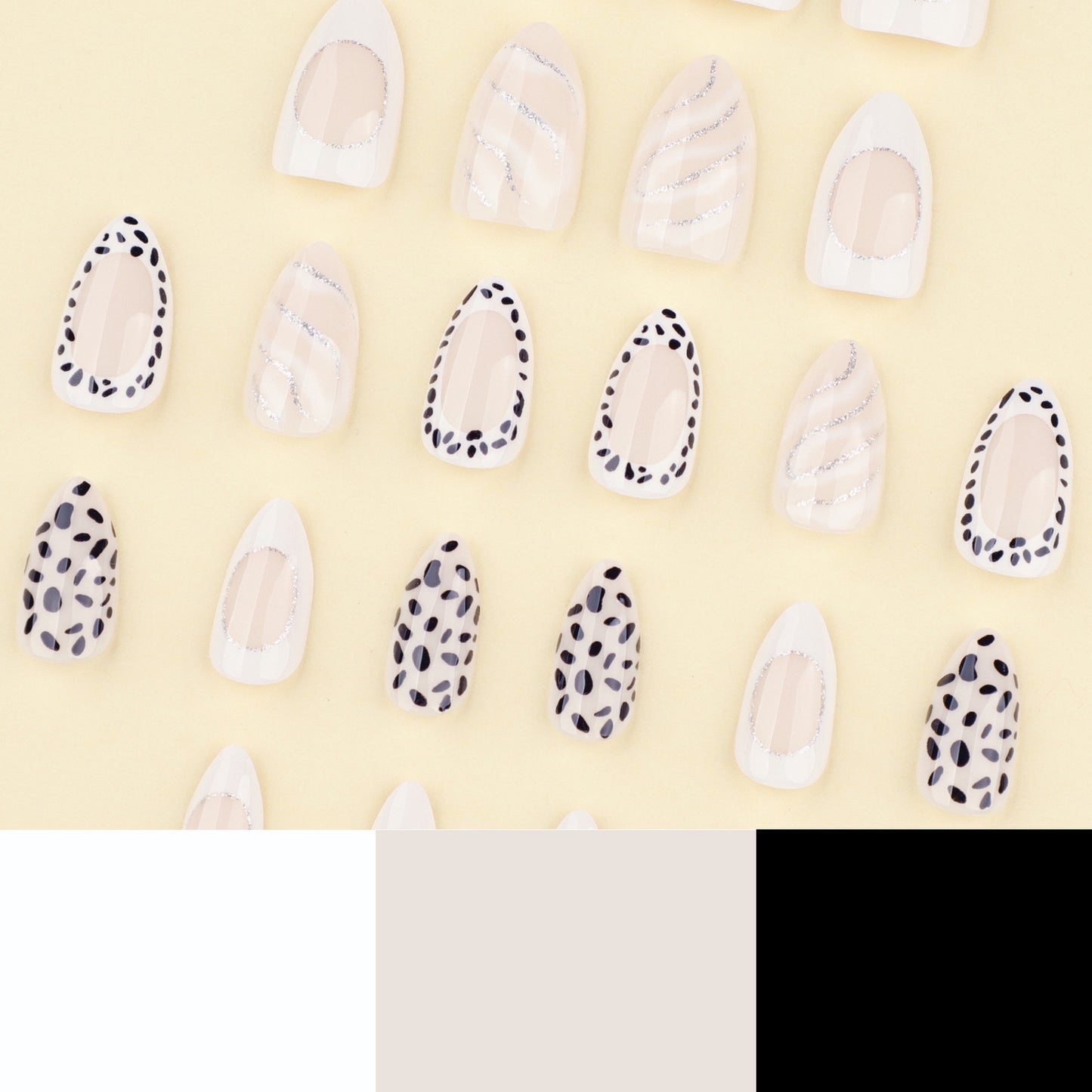 Chic Monochrome Nails with Dalmatian Spots and White Accents