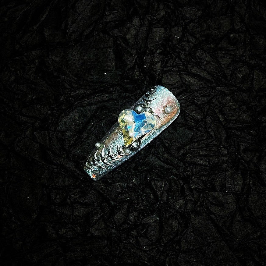 Title Snowfeather Foil | Icy White Ink-Leaf Press-On Nails