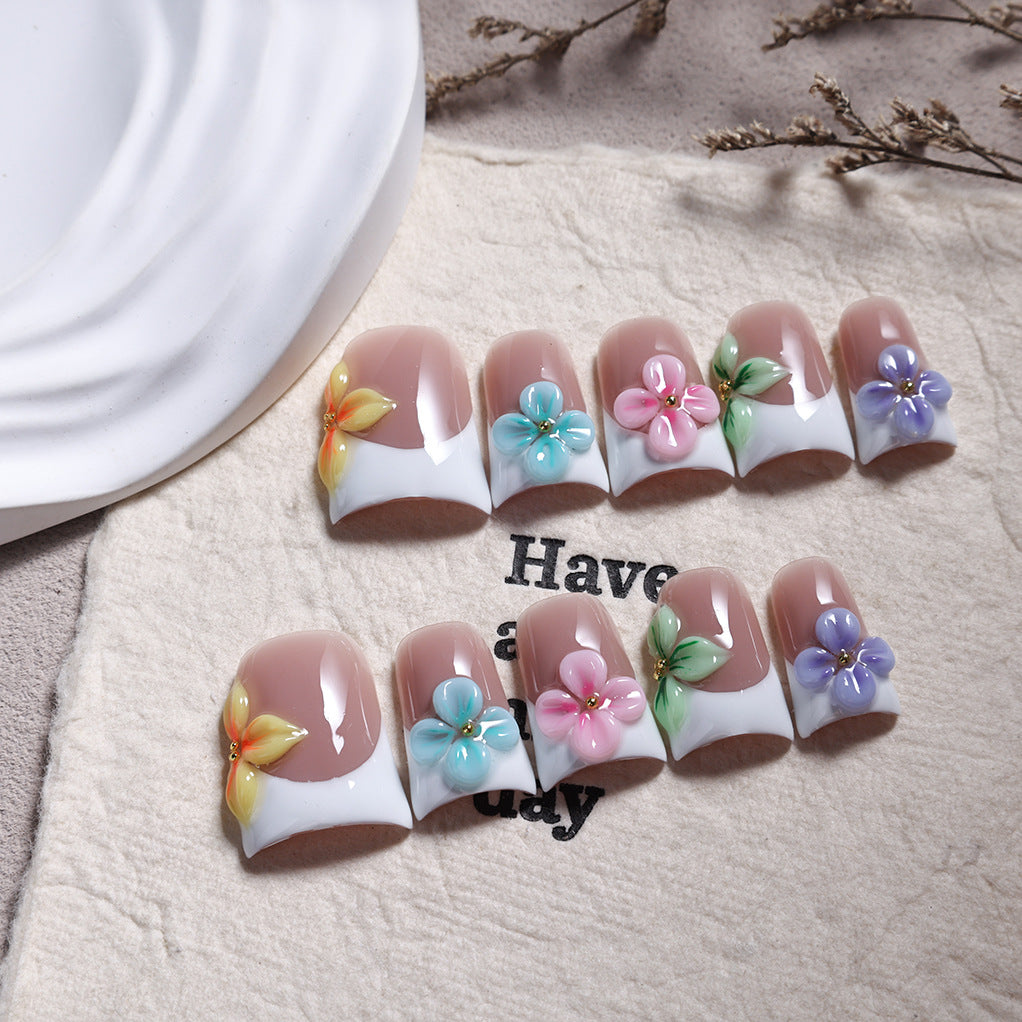 Pastel Floral French Nails with Soft Multicolor Accents