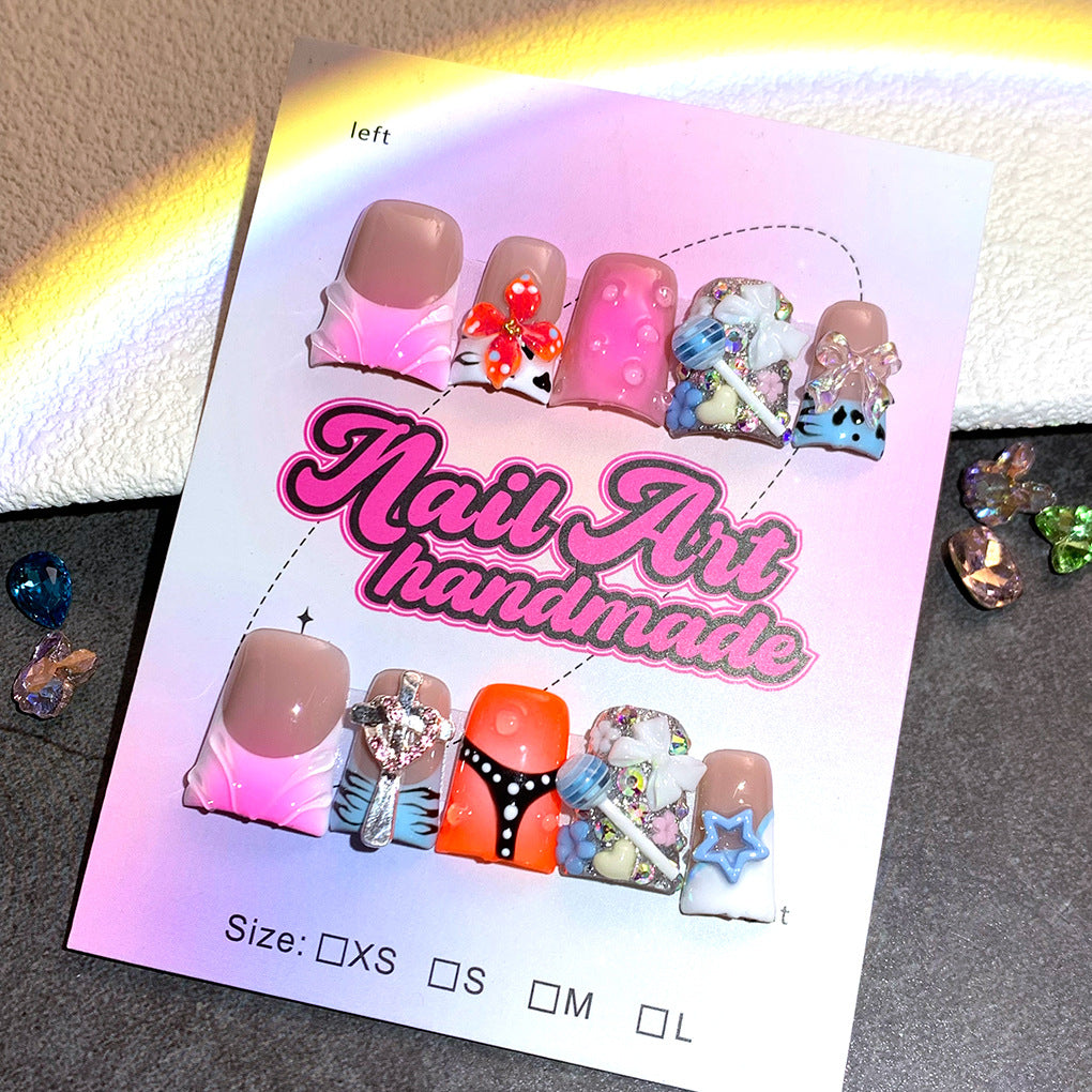 Mixed Color Nails with Sculpted Charms and Playful Details