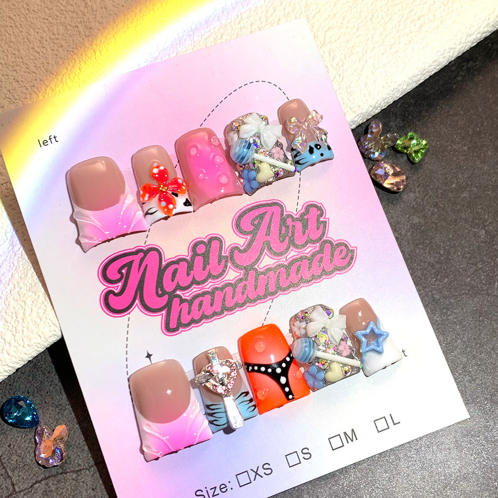 Mixed Color Nails with Sculpted Charms and Playful Details