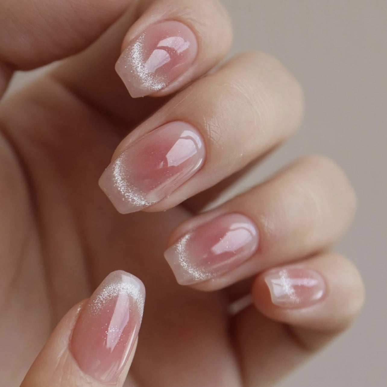 Soft Milky French Nails with Subtle Shimmer Finish