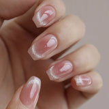 Soft Milky French Nails with Subtle Shimmer Finish