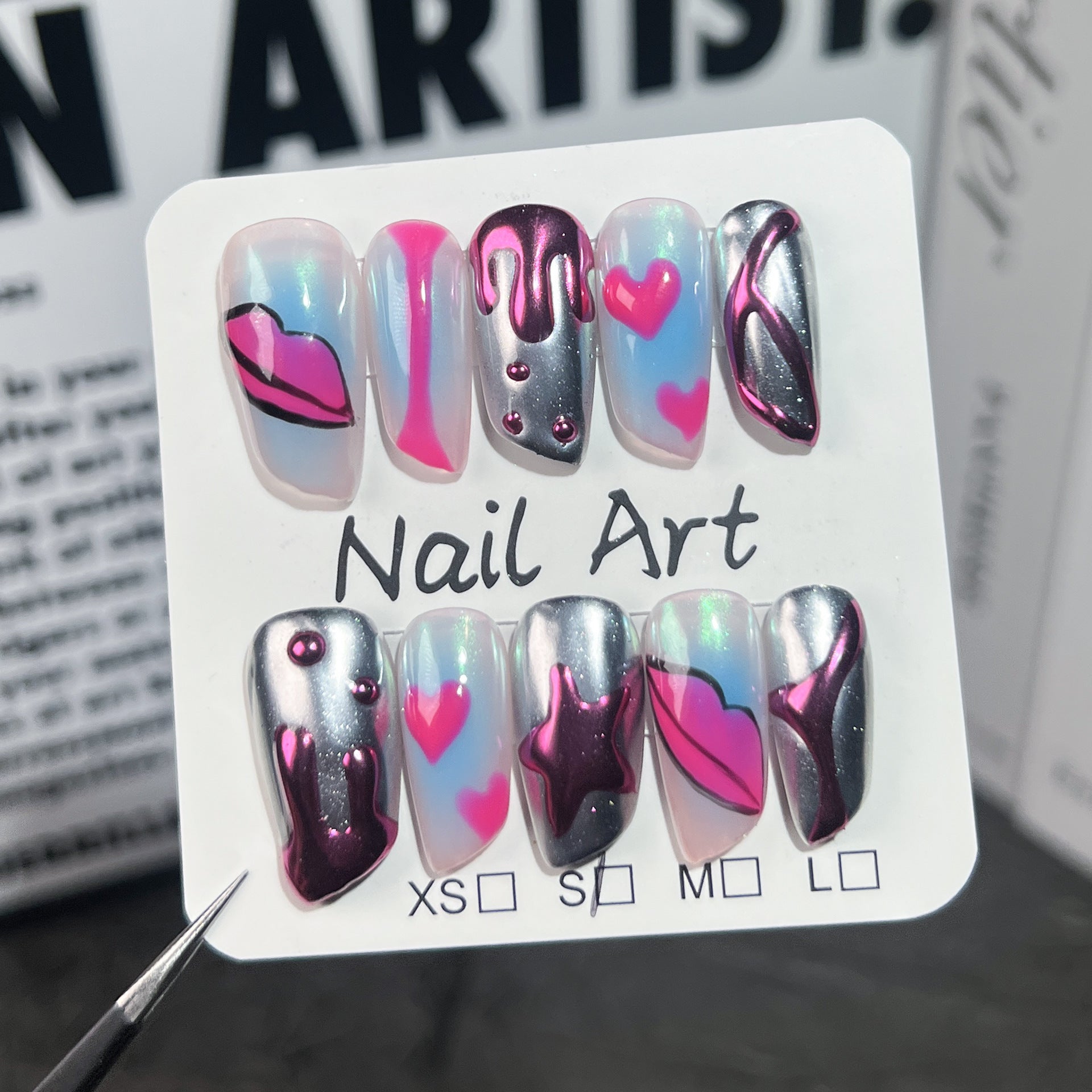 Bold Blush Nails with Sculpted Lip Art and Metallic Pop Accents