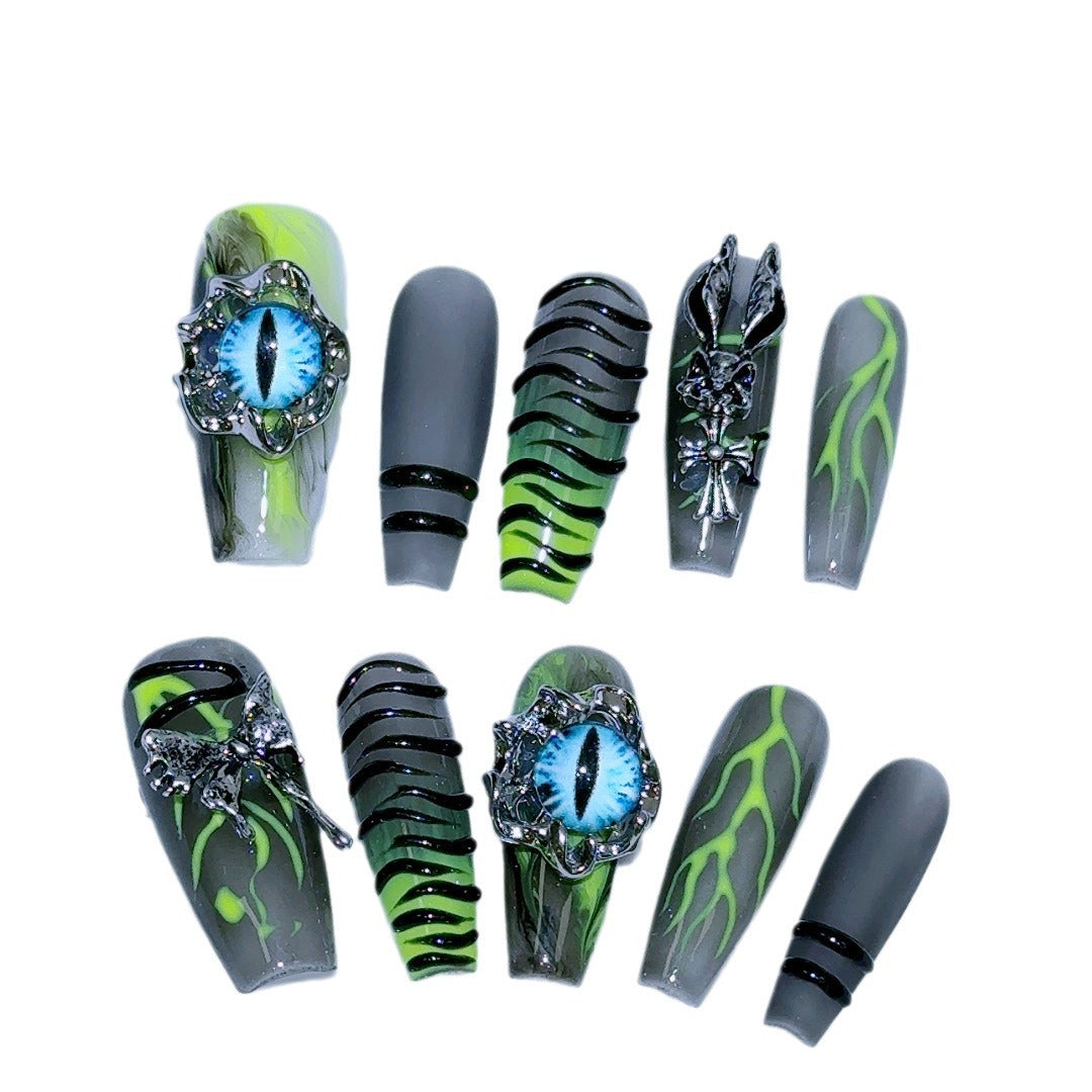 Y2K Press-On Nails with Flame Patterns and Blue Cat-Eye Charms