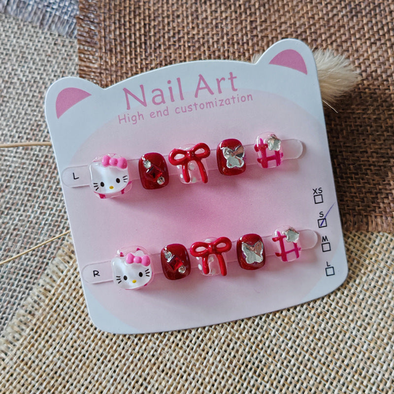 365Nails: "Hello Kitty Laço Rubi" – Unhas Postiças Curtas Ovais Feitas à Mão