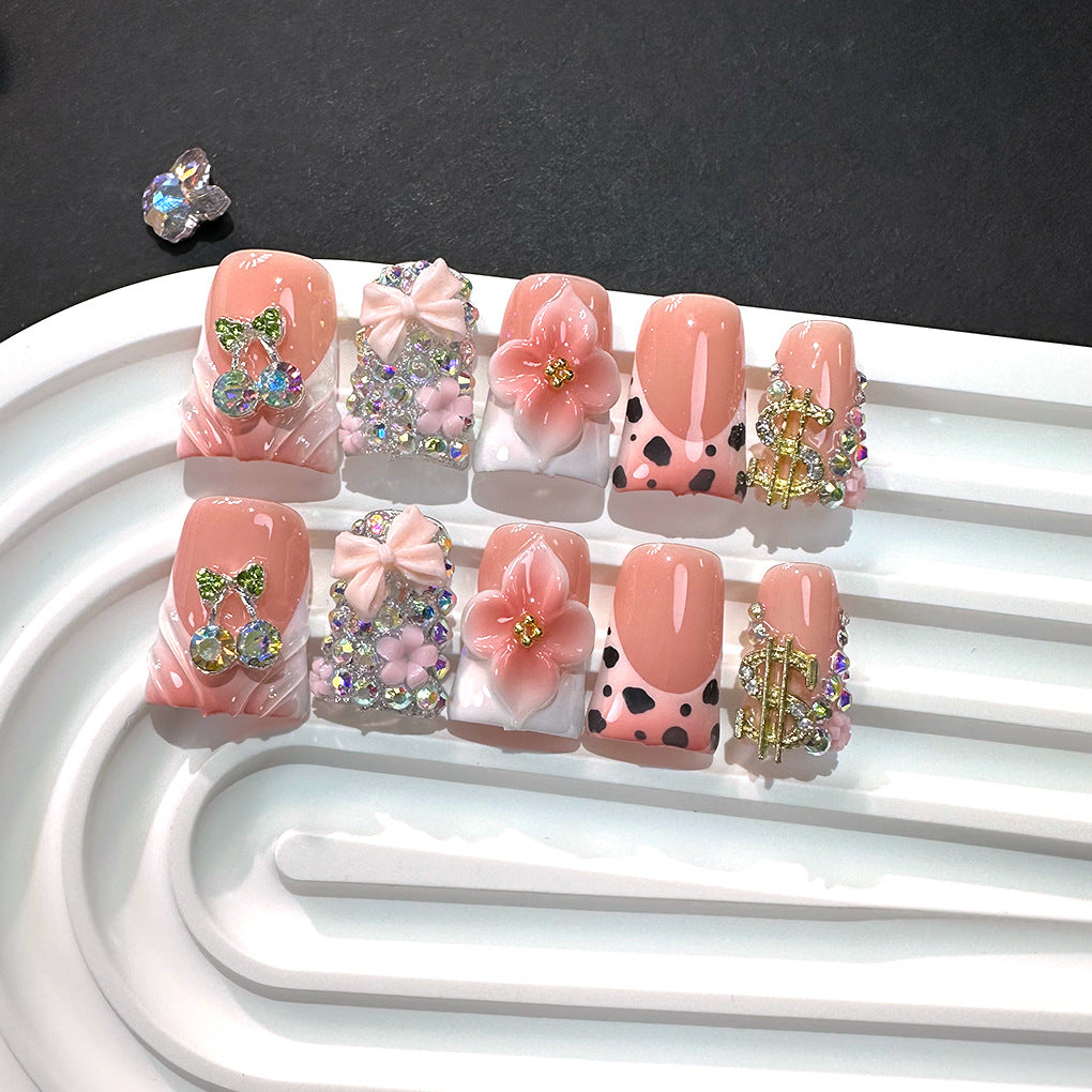 Pink Peach Nails with Floral Charms and Crystal Details