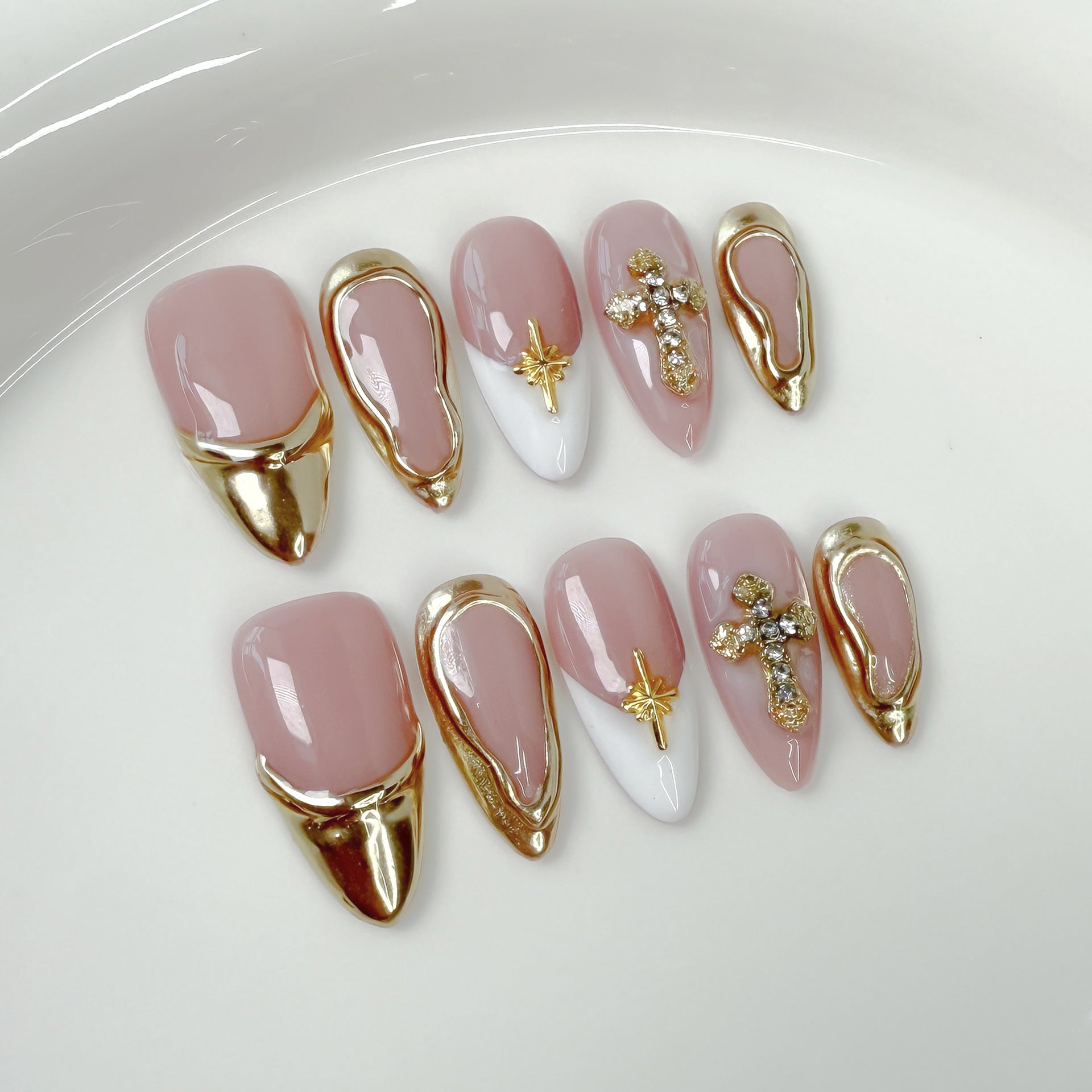 Elegant Gold Frame Blush Nails with Chic Cross Accents