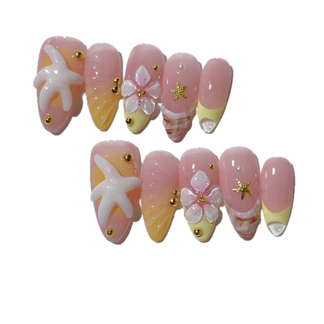 Fleur de plage : « Étoile de mer tropicale » – Ongles press-on forme amande