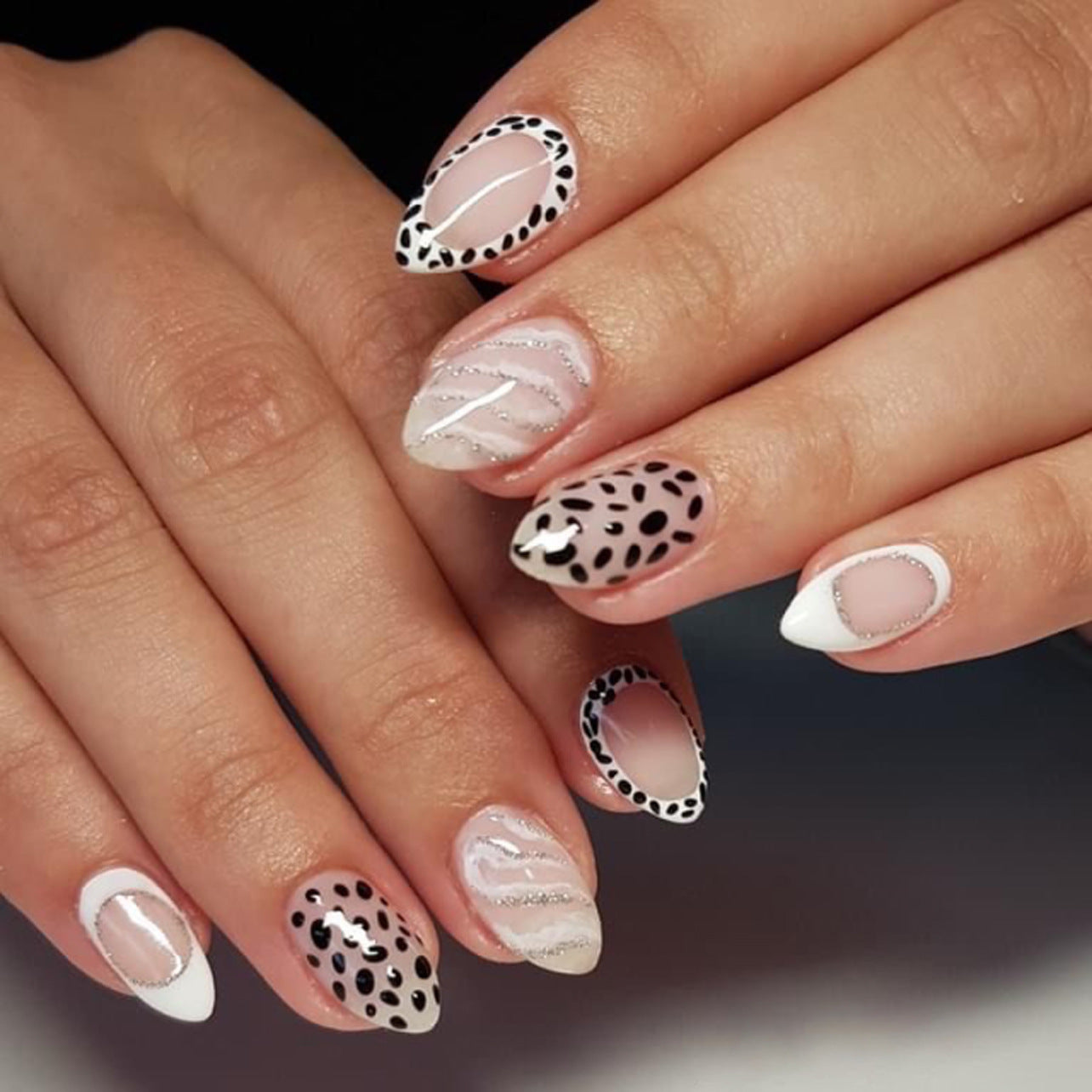 Chic Monochrome Nails with Dalmatian Spots and White Accents