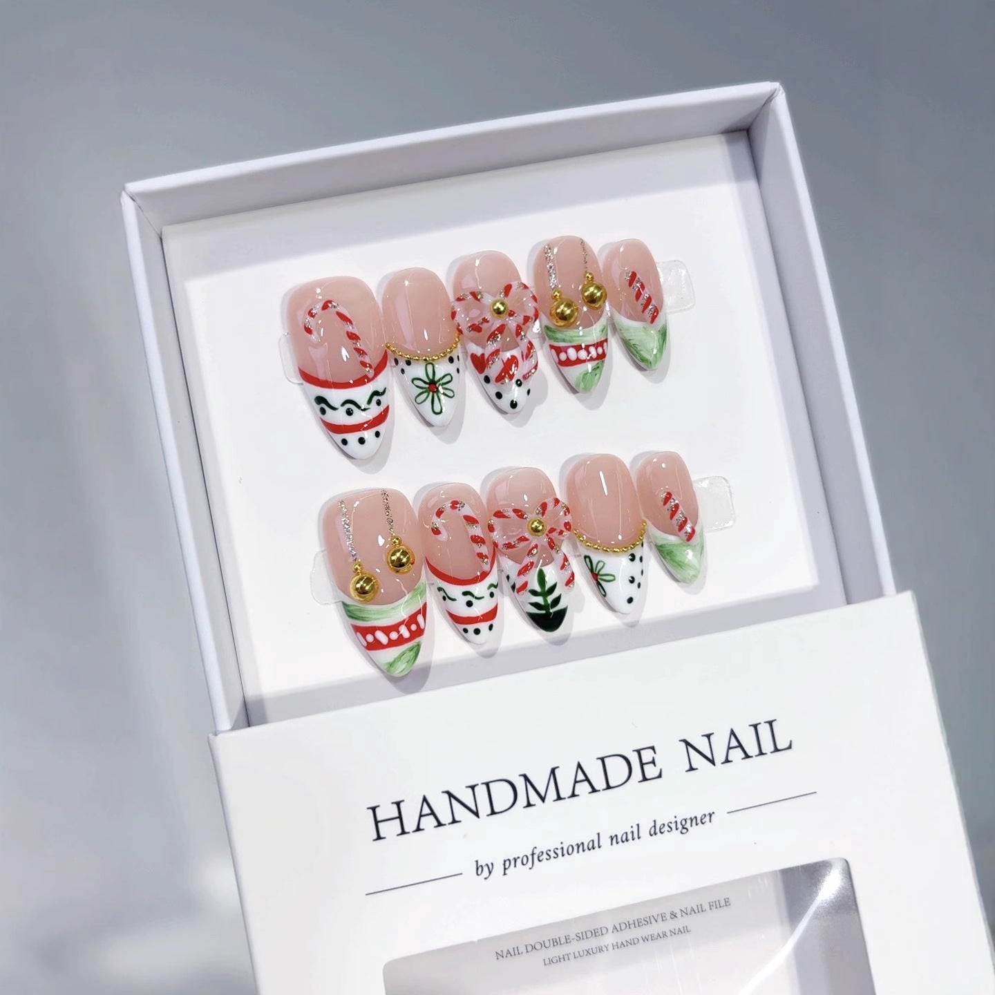 Festive Cheer: "Candy Cane Christmas" – Short Almond Press-On Nails