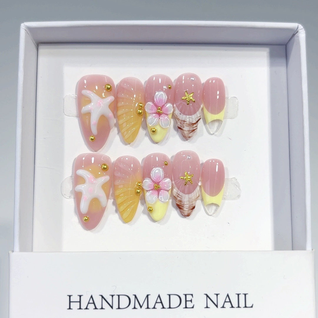Fleur de plage : « Étoile de mer tropicale » – Ongles press-on forme amande