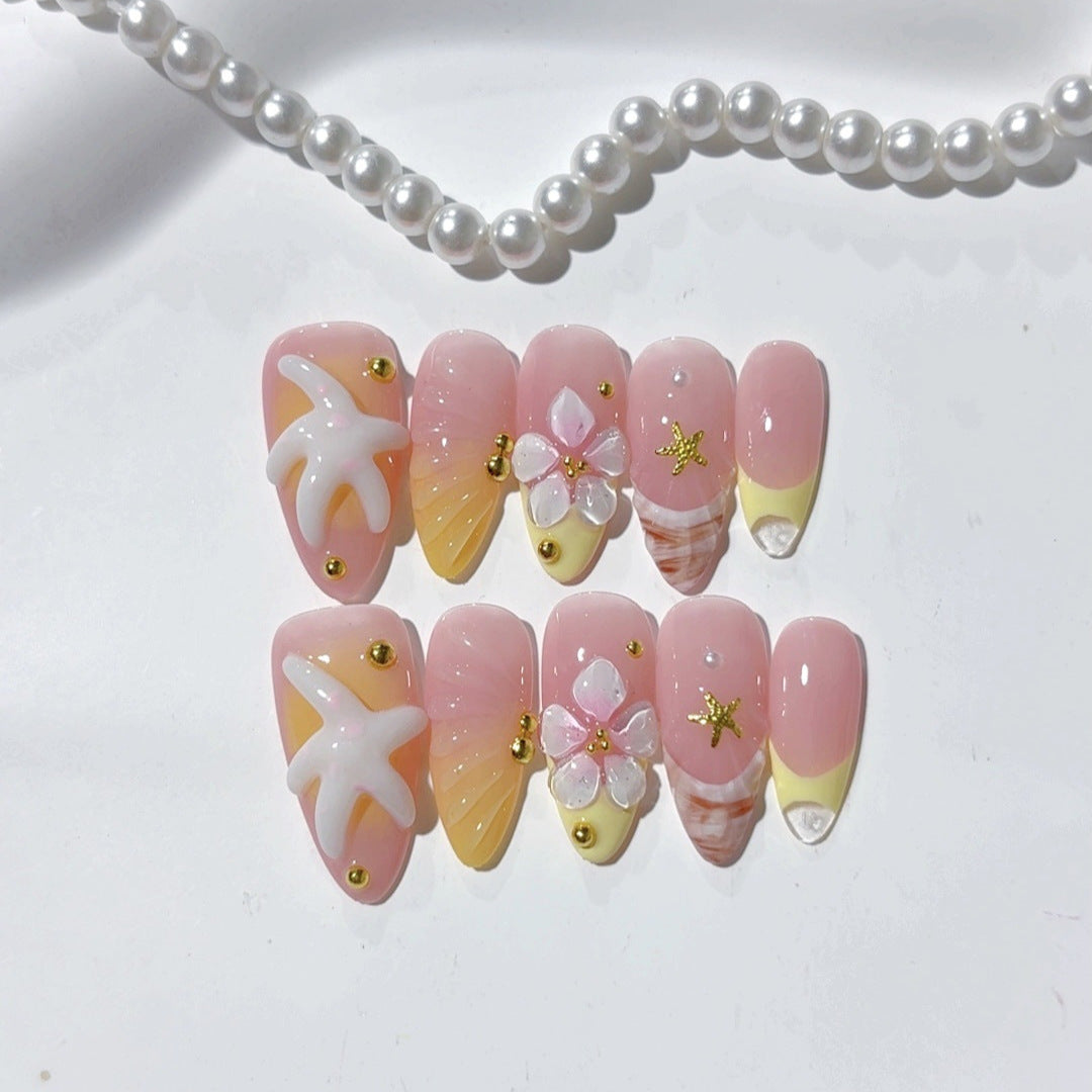Fleur de plage : « Étoile de mer tropicale » – Ongles press-on forme amande