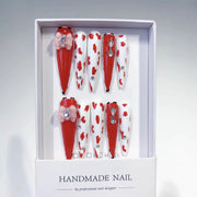 Crimson Crush: « Rose cowgirl » – Ongles press-on stiletto extra longs