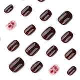 Elegant Burgundy Nails with Floral Accent Art