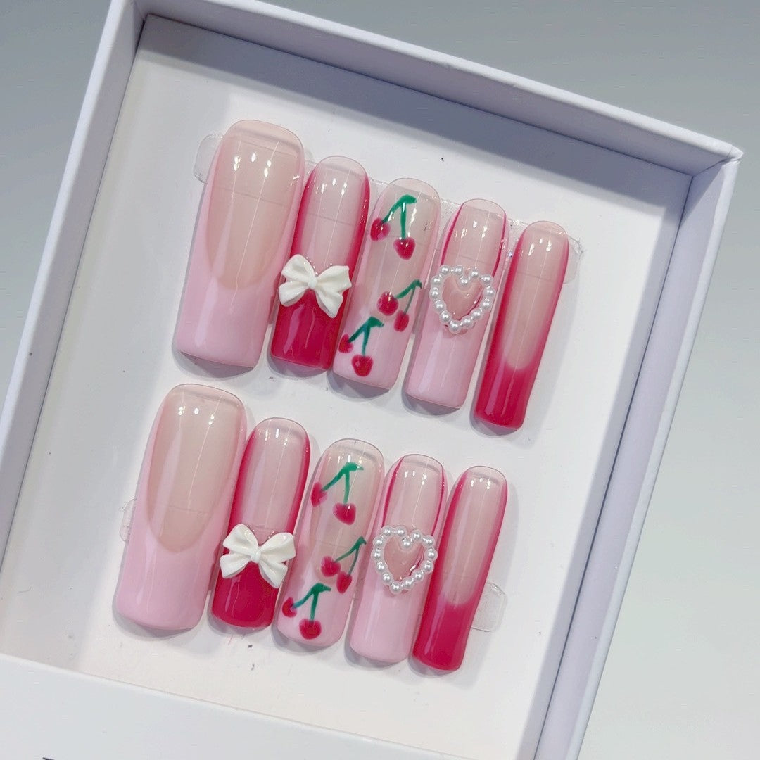 Valentine's day press-on nails: french cherry, bow, and heart designs
