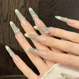 Elegant Nude Gradient Nails with Crystal Charms