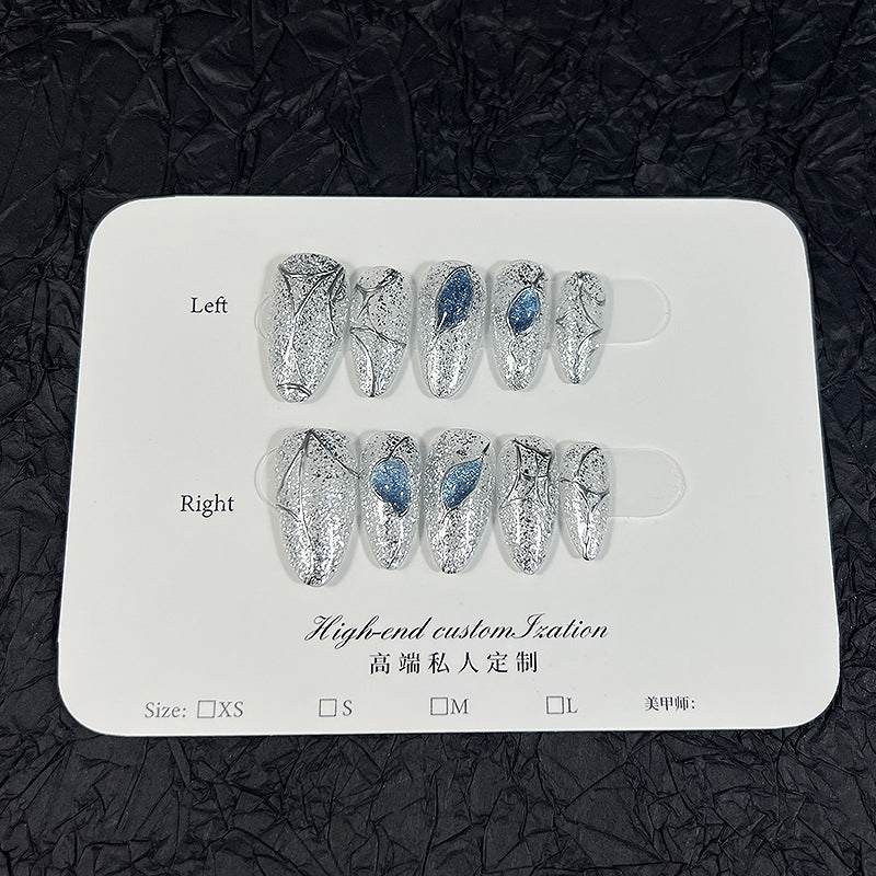 Silver Glitter Cat Eye Press‑On Nails with Blue Gem & Web Design