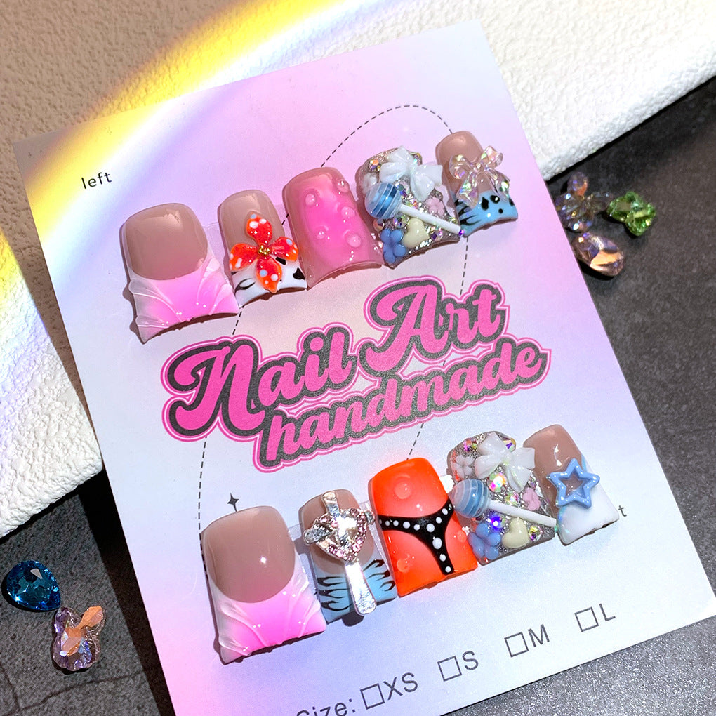 Mixed Color Nails with Sculpted Charms and Playful Details