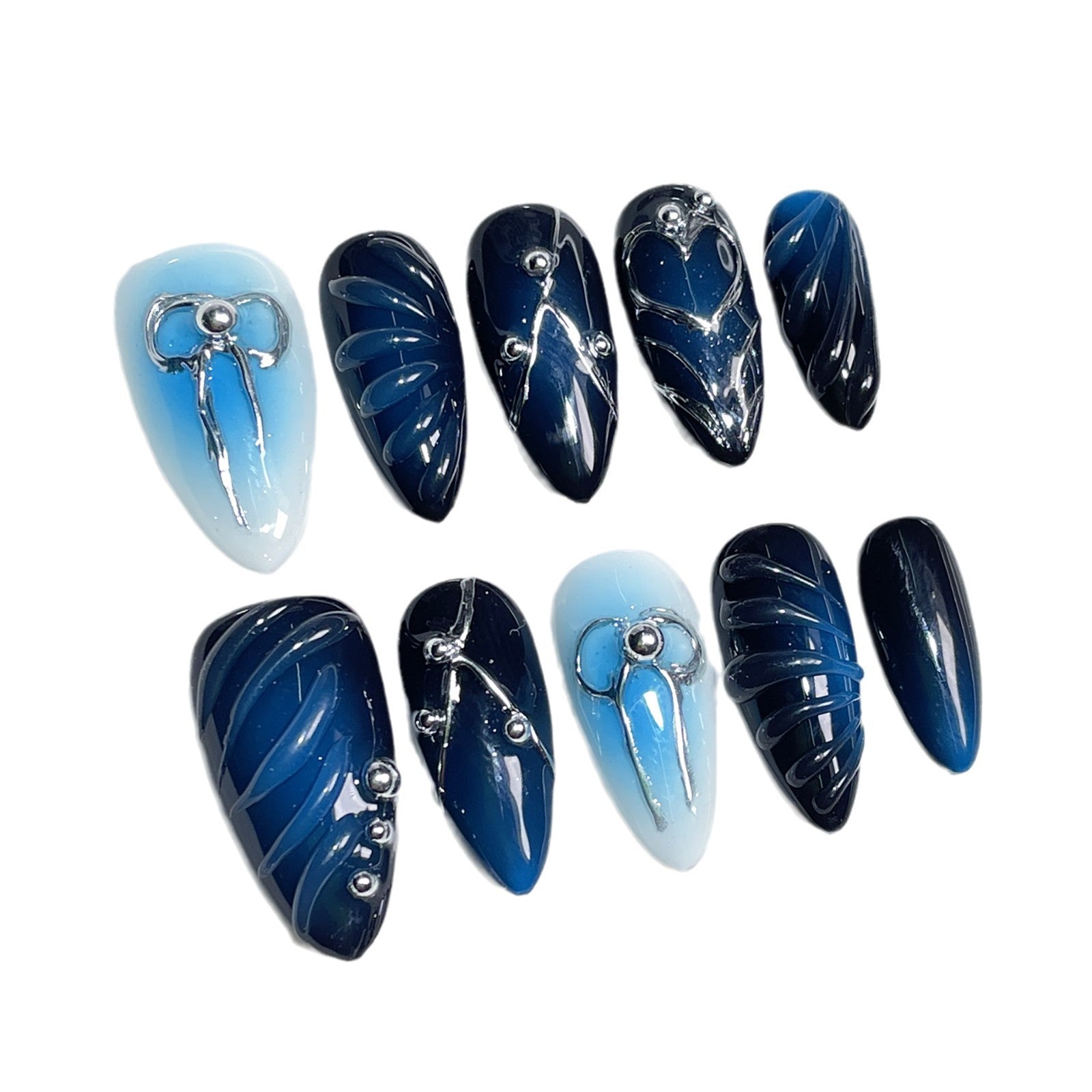 Hand-Painted Blue Gradient Nails with Sculpted Metallic Bow Accents