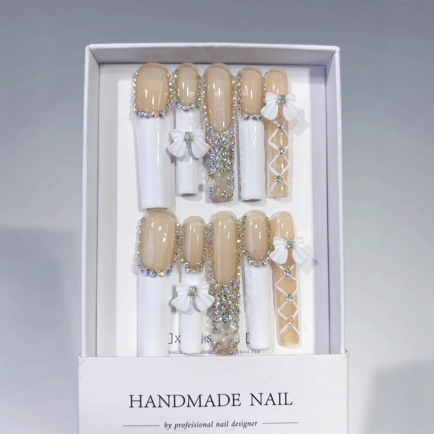 Soft Nude French Bow Crystal Elegance Press On Nails