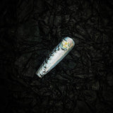 Title Snowfeather Foil | Icy White Ink-Leaf Press-On Nails
