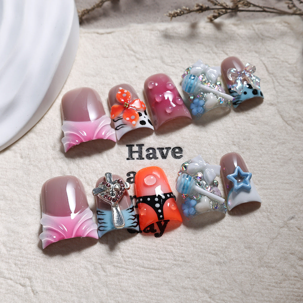 Mixed Color Nails with Sculpted Charms and Playful Details