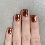 Shimmer Brown Cat-Eye Nails with Glossy Elegant Finish