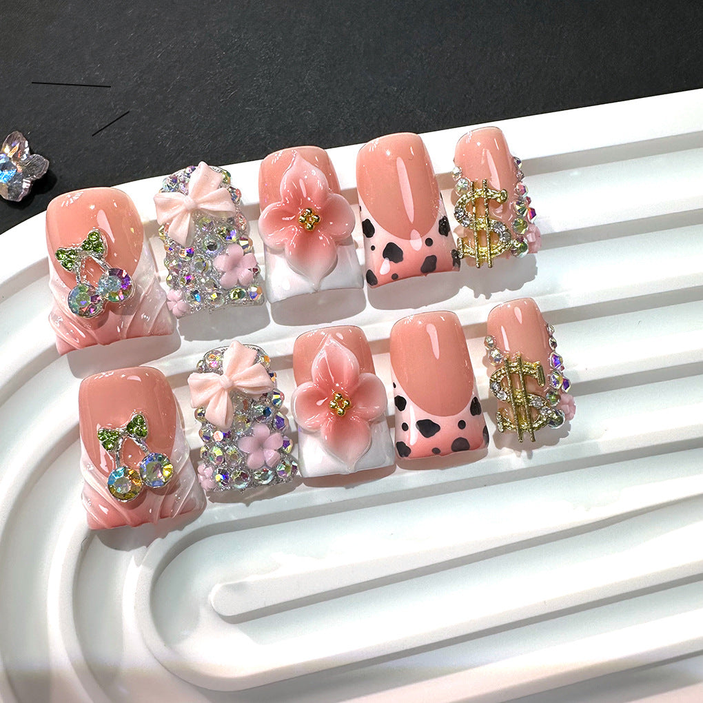 Pink Peach Nails with Floral Charms and Crystal Details