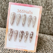 Cosmic Fatale: "Mocha Marble Flow" – Long Sharp Stiletto Handmade Press On Nails