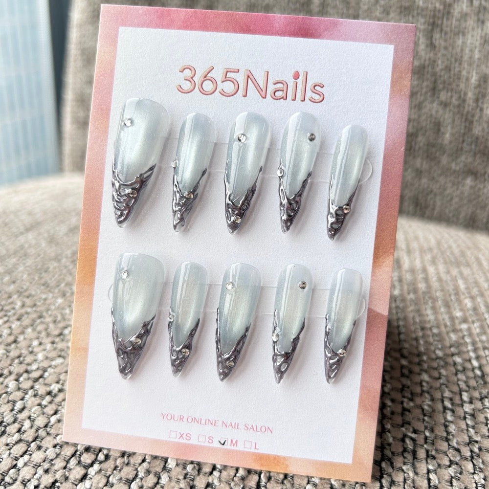 Femme Fatale: "Moonlight Armor" – Icy Blue Cat Eye Base with 3D Liquid Silver Chrome Tips & Rhinestones Long Stiletto Nails