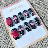 Sculpted Flora: "Polka Noir Bow" – 3D Red Flowers, Pink Bows & Rhinestones on Black Polka Dot Nails