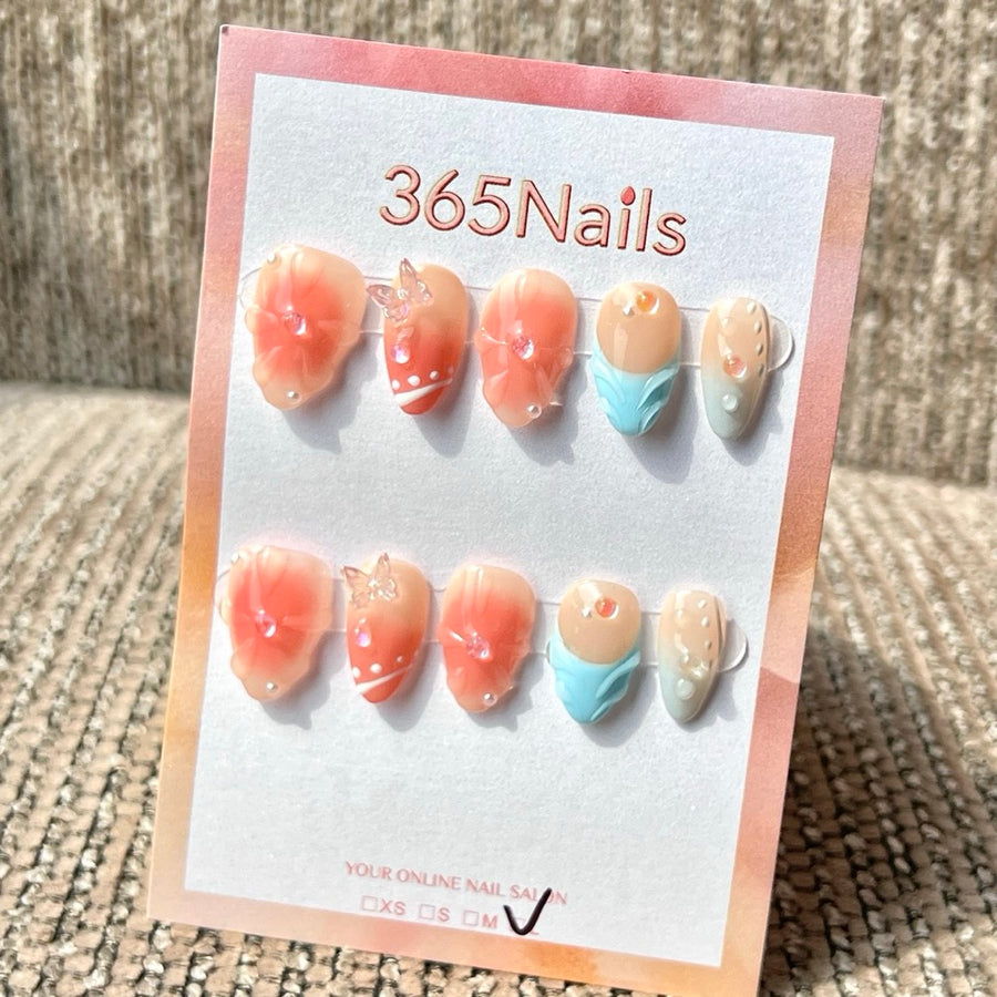 365nails — Ongles press-on faits main, forme amande, courts, rose nude à motifs fleurs et papillons