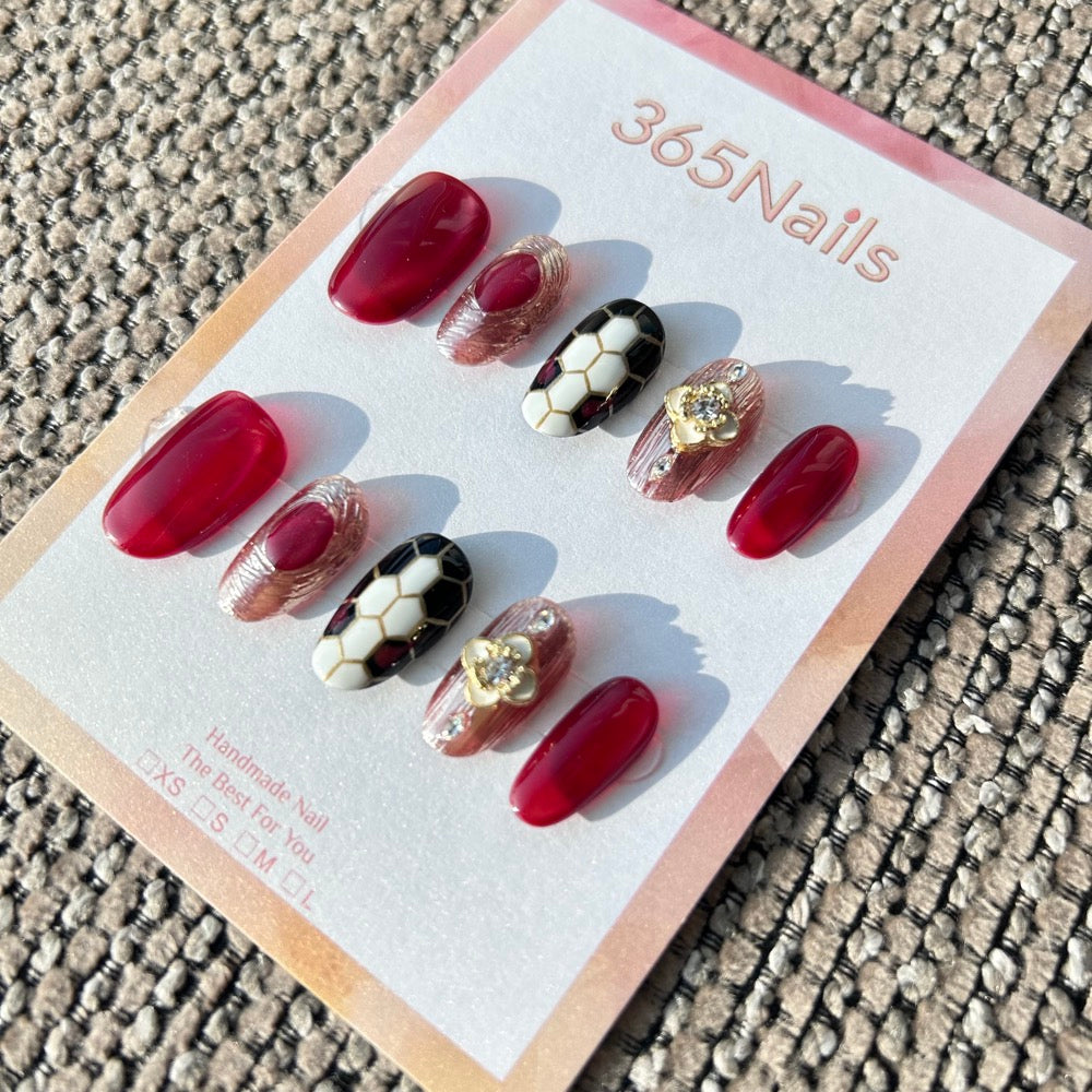 The Gilded Serpent: "Crimson Monarch" – Wine Red & Champagne Gold Textured Press-On Nails with Baroque Cross Charm