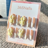 Sculpted Flora: "Creamy Jasmine" – 3D Soft Yellow Flowers with Pearl Accents on Elegant French Tip Almond Nails