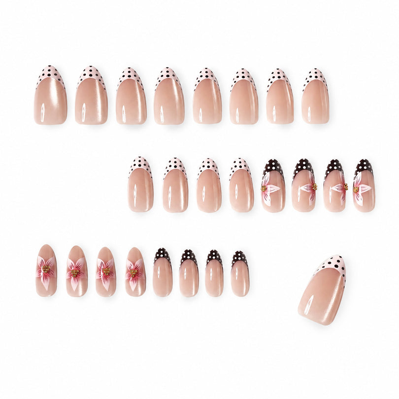 Layout of 24 almond nails in three rows with cat-eye shimmer and floral accents