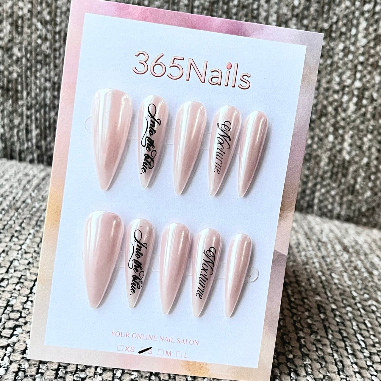 Shimmer Nude Stiletto Press-On Nails with Graphic Text