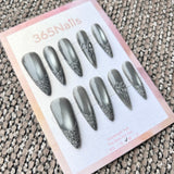 Femme Fatale: "Silver Mist" – Grey Cat Eye with Flash Glitter French Tips & Crystal Bow Charm Long Stiletto Nails