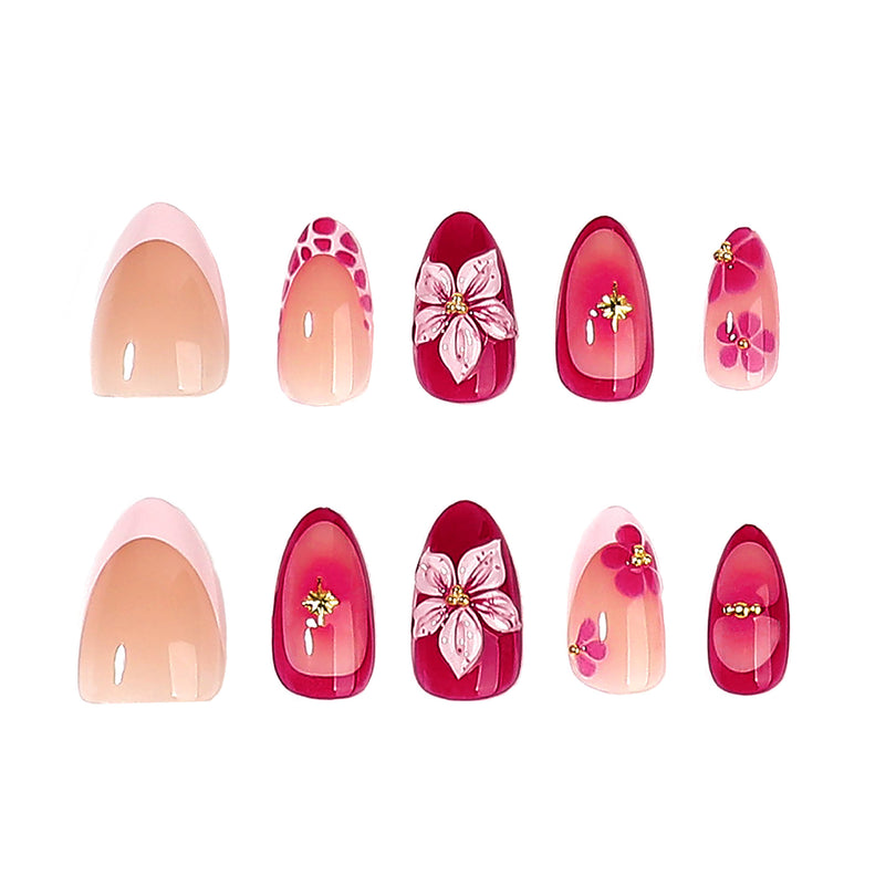 Ten almond press-on nails arranged in two rows showing floral and dot designs