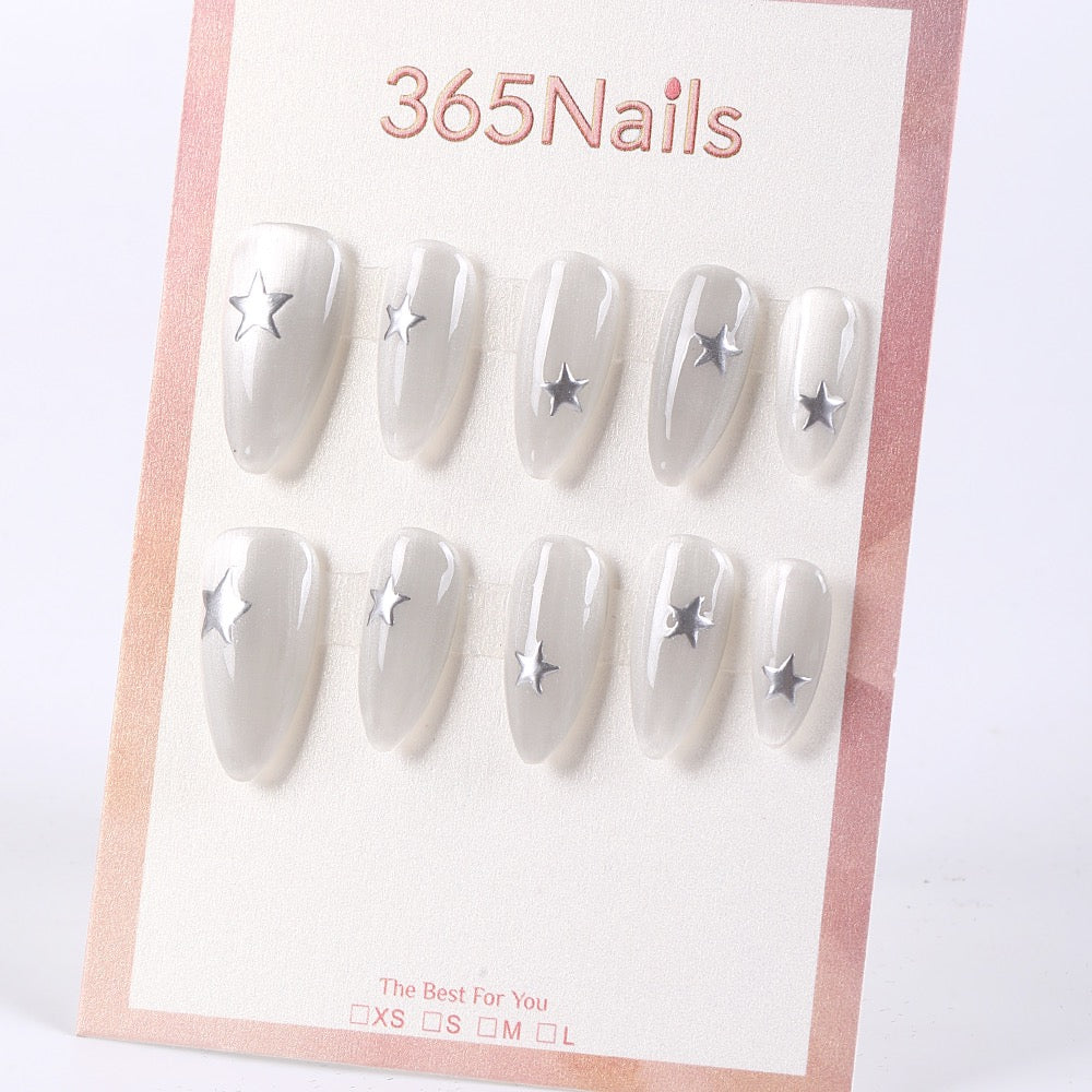 365Nails Moonlight Grey Almond with Silver StarsSold in packs of 5. Minimum order: 1 pack (5 pcs). Quantity = number of packs. Qty 1 = 5 pcs